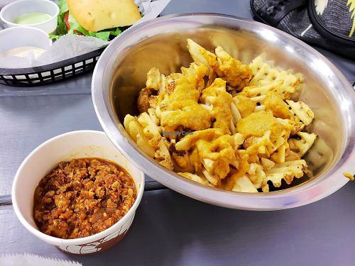chili cheese fries with chili on the side,  at Meta Burger in Denver
