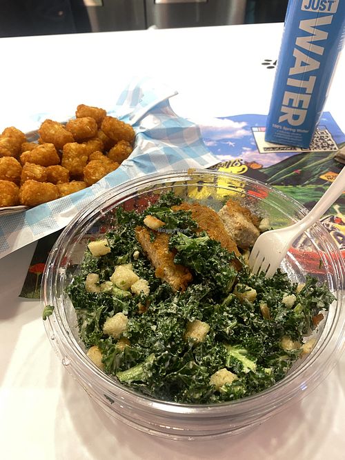 Dinner: H2O, Tots, and Kale YEAH Caesar Chick’n’ Salad 💗  at Monty's Good Burger in Riverside