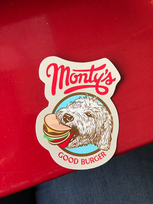 Monty with burger sticker at Monty's Good Burger in Riverside