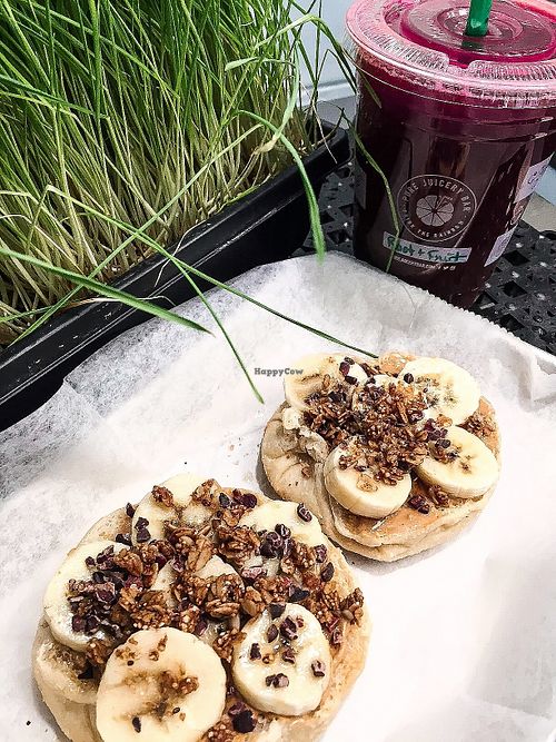 English muffin with banana, granola, peanut butter, cacao chips at Pure Juicery Bar in Cary