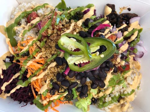 Chipotle Bowl
Quinoa or Brown Rice, Romaine Lettuce, Black Bean, Pico de Gallo, Walnut Taco, Jalapenos, Guacamole, Cilantro-Date Dressing, Cashew Nacho Cheeze at Pure Juicery Bar in Cary