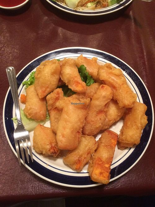 Crispy Yams. Item is not on menu. Might be in buffet not sure. I asked for it and they brought it no questions asked. Unsure on price. Literally it is chunks of sweet potato deep fried in batter and served with a ketchupy sauce for dipping. at Affinity Vegetarian Garden in Winnipeg