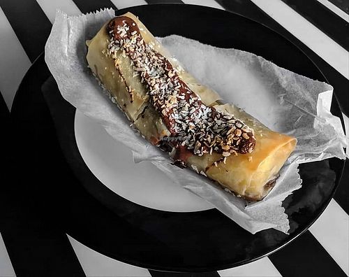 Banana, chocolate and coconut inside pastry! at Domu in Bangor