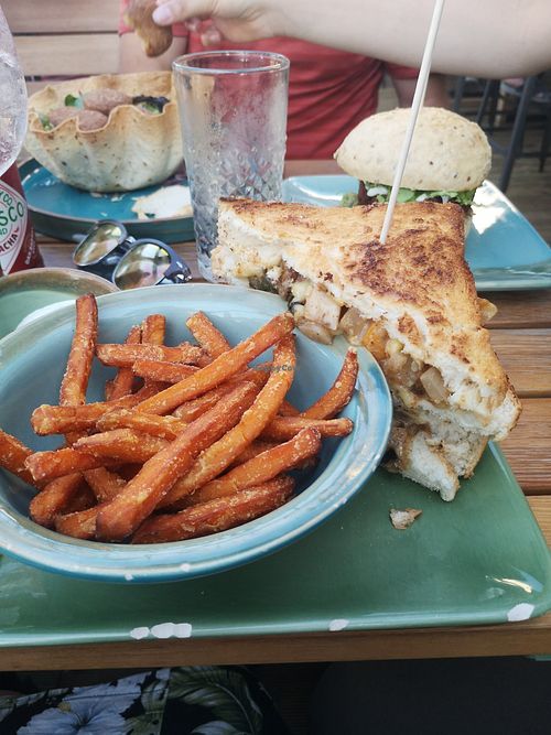 Vegan sandwich coming with a side of fries at King's Caffe in Malinska