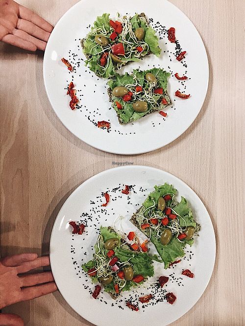 “Zrno” raw option: seed cracker with seeds and spinach vegan cheese spread at bistro ZDRAVO in Sarajevo