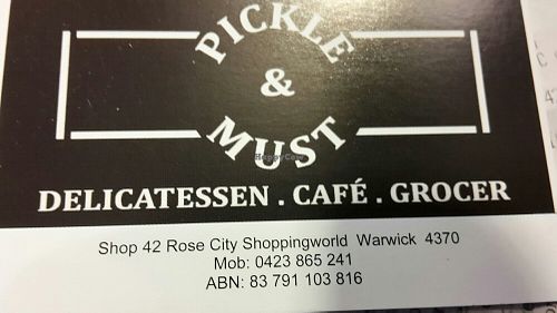Business card at Pickle & Must Deli in Warwick