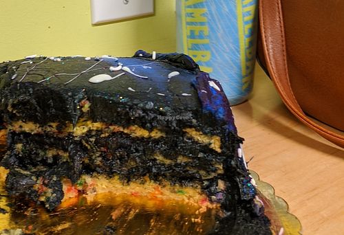 The frosting is black, and the almost non-existent cake is the yellow funfetti  at Haddonfield Donut in Haddonfield