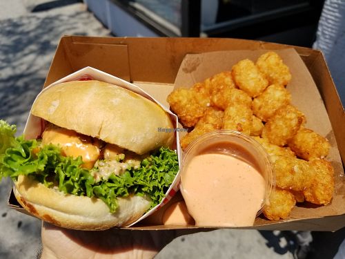 Single Buger, tater tots with house sauce and chocolate vega n shake at Monty's Good Burger - Koreatown in Los Angeles