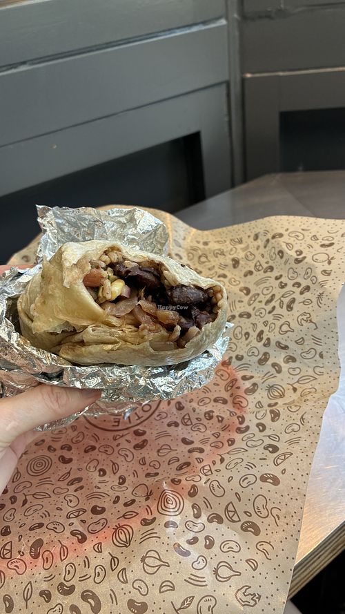 Burrito a few bites in. I built a small one    at Chipotle - Boylston St in Boston