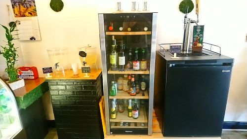 Wine and water options at Green Kafé in Wilton Manors