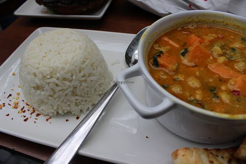 Sweet potato, chickpeas coconut curry served with rice at ALEX in Berlin