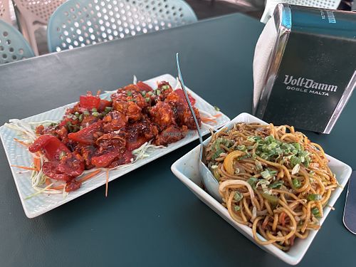 Amazing vegan Szechwan mushroom and crunchy noodles!  at Curry and Sushi in 