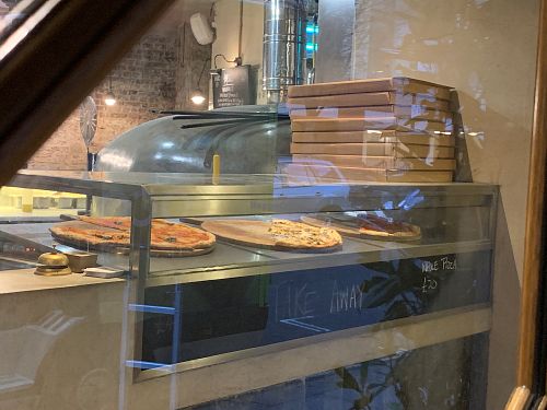 Some by the slice! at Homeslice - Fitzrovia in London