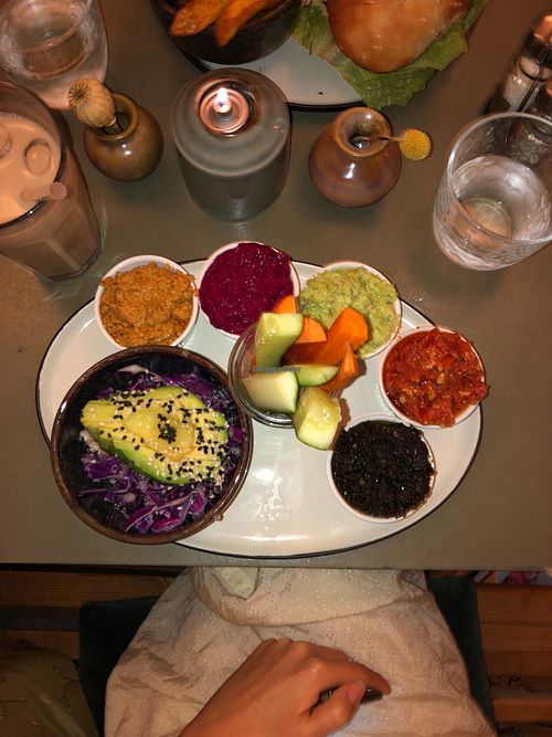 Their platter with different dips including hummus, edamame hummus and beetroot hummus 

(Asked for a salad instead of bread On the side) at Cafe Blå in Copenhagen