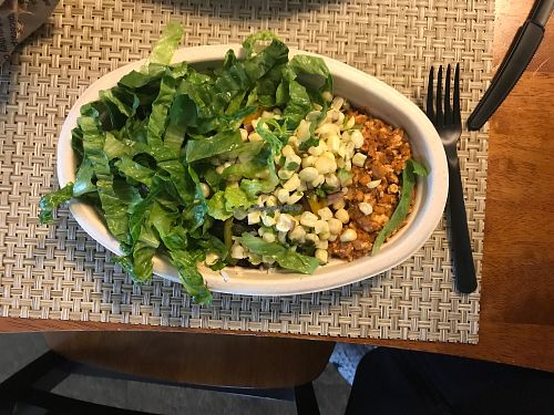 Black beans, white rice, sofritas, corn salsa, grilled vegis and lettuce  at Chipotle in Selden