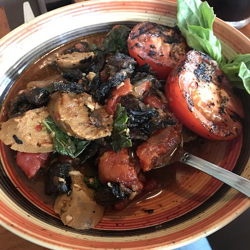 Vegan sausage mushroom eggplant tomato dish at DeepWater Brewing Company in Blue Hill