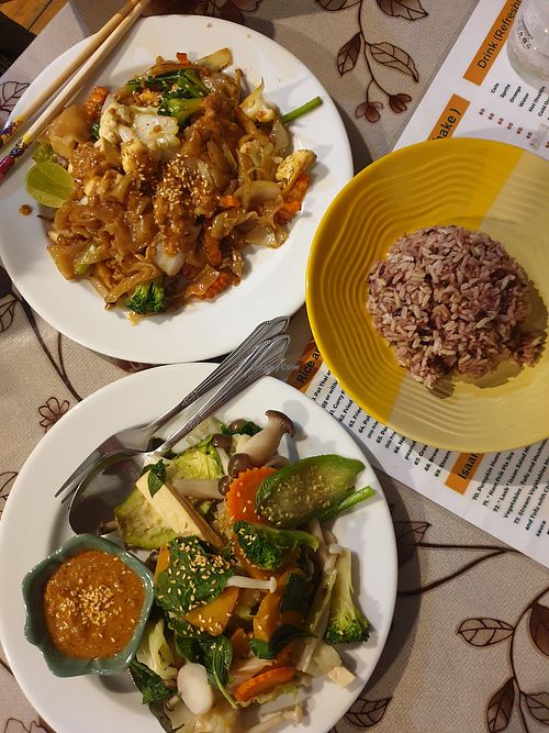 Pad see e u, steamed veg mushrooms rofunwith peanut sauce. And brown rice. at May Kaidee in Bangkok