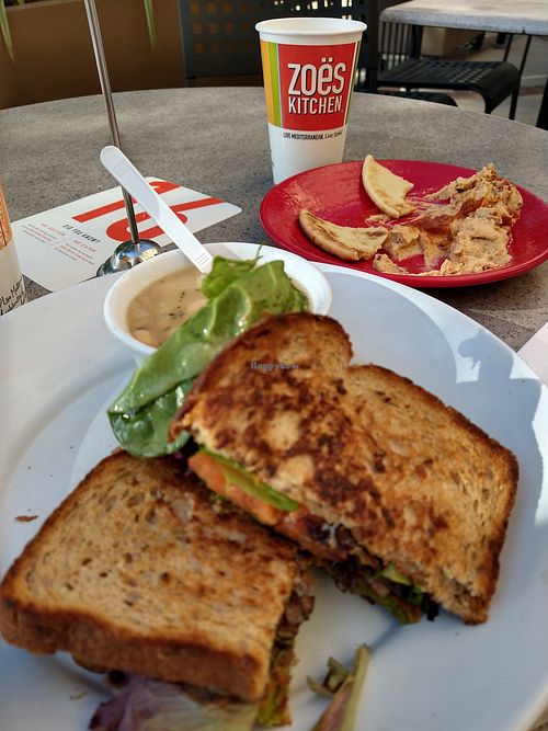 FLT and braised white beans, plus almost-gone spicy hummus at Zoës Kitchen - Rice Village in Houston