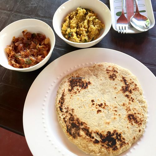 Coconut rotty with onion chutney and dry dahl at Sri Dhara Restaurant  in Unawatuna