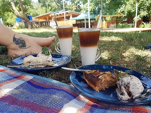Life is better barefoot. The cake is better with ice cream. And coffee is better with coconut milk. That are just life facts. at Bistro Otevřená zahrada in Brno