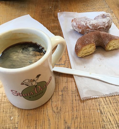 Coffe and donuts seated in the shop at Stan's Donuts and Coffee - South Loop in Chicago