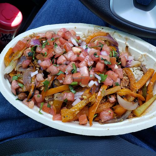 Bowl with brown rice, pinto beans, sofritas, fajita vegetables, fresh tomato salsa at Chipotle in Weatherford