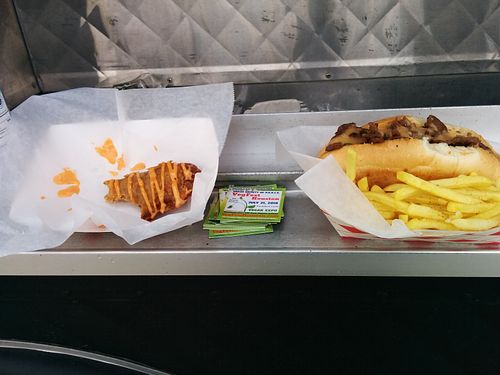 Boudain empanadas, Philly cheesesteak and fries. So good, hot or cold! at Houston Sauce Co in Houston
