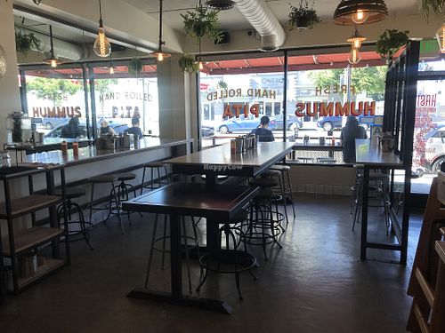 Dining room with outdoor seating at Hasiba in Los Angeles