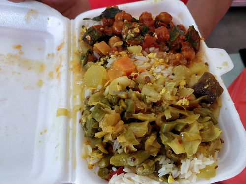 Rice with mixed vegetables in Styrofoam box at Krsna's Free Meals in Central Singapore