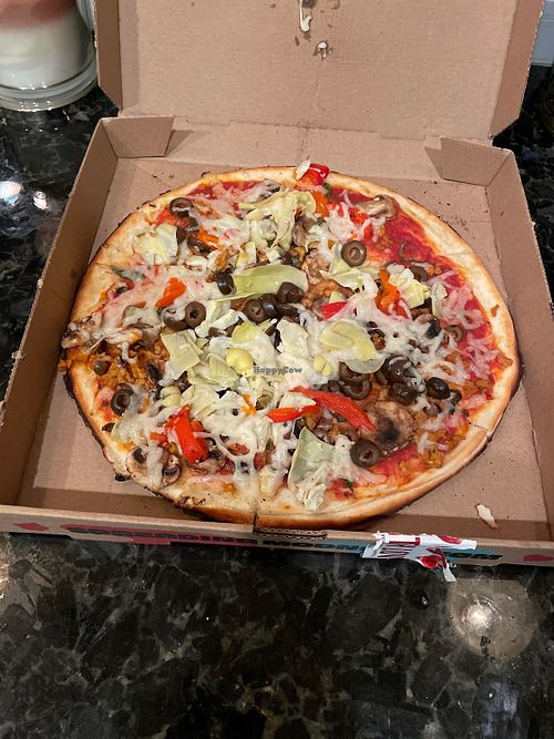 Medium veggie pizza with olives artichokes fresh basil, roasted bell pepper, vegan cheese and vegan sausage.  at Mod Pizza in Cerritos