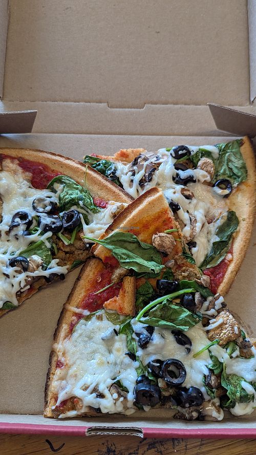 Spicy tomato sauce and cauliflower crust topped with plant-based cheese and sausage, spinach, black olives, and mushrooms. at Mod Pizza in Daly City