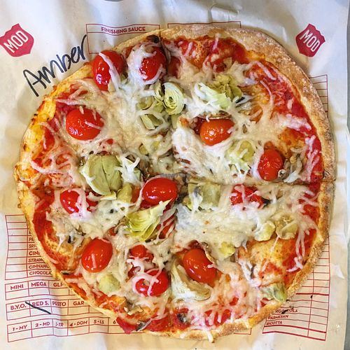 Pizza with mushrooms, artichoke hearts, grape tomatoes, and dairy free cheese.  at Mod Pizza in Castle Rock