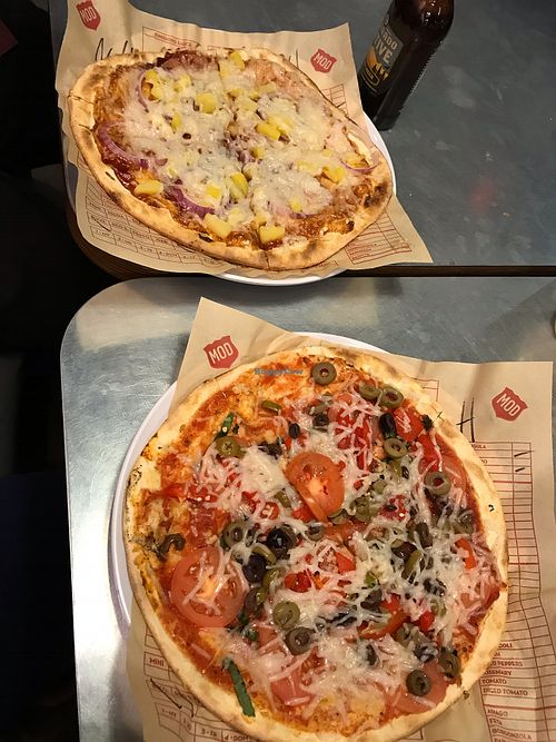 bbq pineapple onion pizza and tomato garlic olive pizza at Mod Pizza in Castle Rock