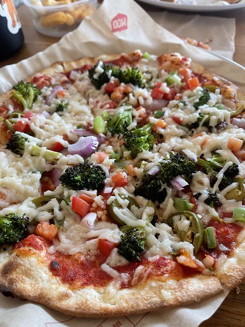 Vegan cheese, jalapeños, red onion, roasted broccoli, garlic, bell pepper and diced tomato - so good!! at Mod Pizza in Westminster