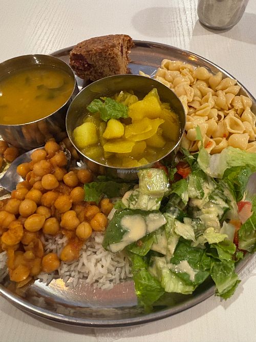 Banana berry cake, Dahl, rice, salad, cabbage with cauliflower and potatoes, rice, chickpeas in light curry sauce. Yum! at Govinda's in Ottawa