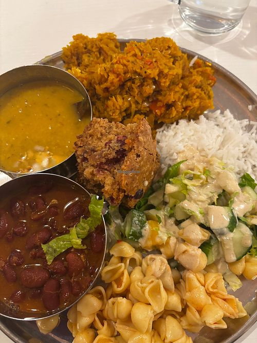 Tasty Braised cabbage, kidney bean stew, Dahl, rice, salad, light pasta dish, berry coffee cake. Very filling and tastes good and healthy! at Govinda's in Ottawa