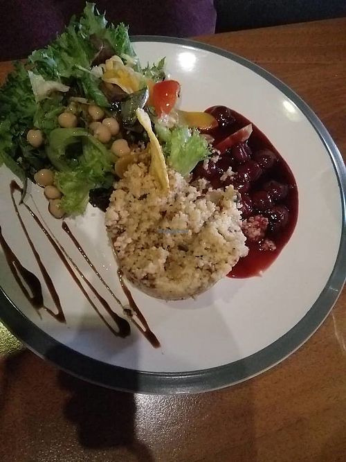 Vegetable couscous with fresh chickpea salad and cherry sauce at Läti Saatkond in Torva