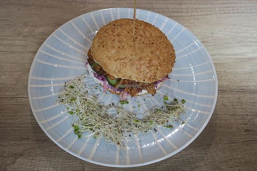 Jackfruit burger with vegan mayonnaise and, unfortunately, a lot of bun. at Lemon Tree in Kielce