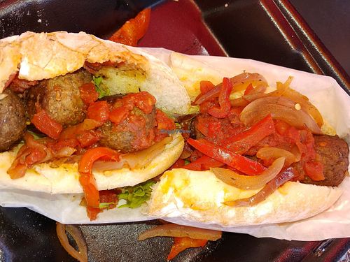 Johnny's meatball sub on a French roll and peach tea, in an almost biodegradable cup at Zunzi's in Savannah