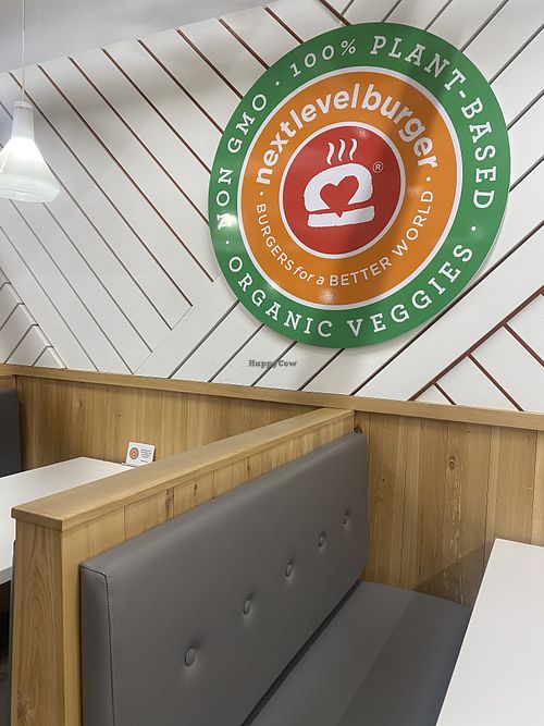 Booth Seating Area and Signage  at Next Level Burger - Potrero Hill in San Francisco