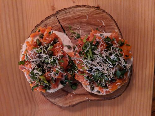 (Carrot) Lox and cream cheese bagel  at Persephone Snug in Vancouver