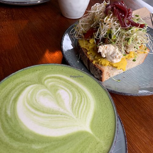 Vegan matcha latte & vegan hummus & feta sandwich at Tanner in Helsinki
