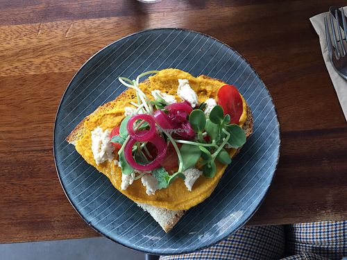 Sourdough bread topped with parsnip hummus and almond feta at Tanner in Helsinki