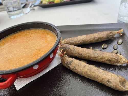 Can’t remember name of dish. Vegan sausage and soup   at Güjžina - Green One Bistro in Ljubljana