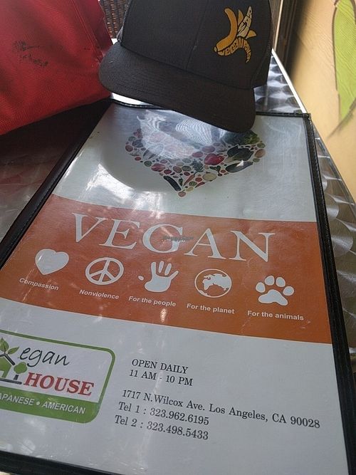 front of menu at The Vegan House in Hollywood