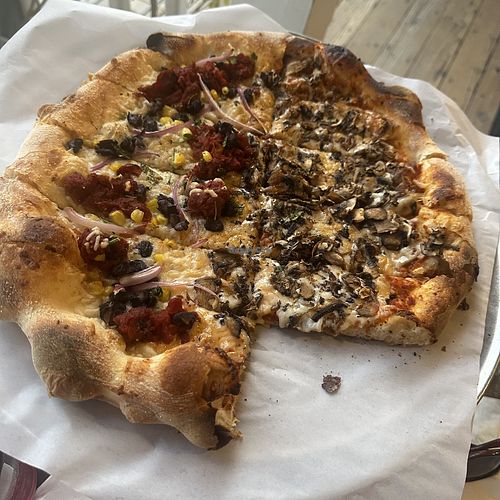 large vegan 1/2 and 1/2, salsa, pizza, and mushrooms and onion pizza  at Full Of Life Flatbread in Los Alamos