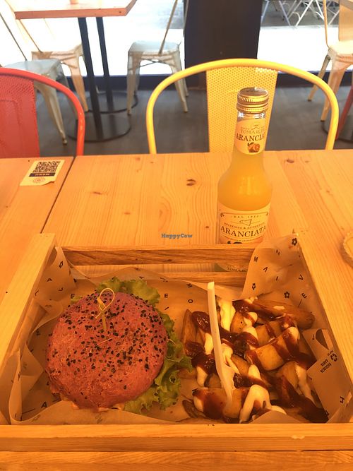 The cherry bomb burger and Tomarchio Aranciata   at Flower Burger in Palermo