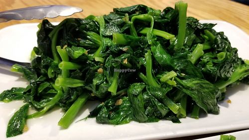 Sauteed pea pod leaves at Bodai Vegetarian in Brooklyn