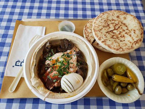 Hummus with mushrooms. Hard boiled egg is optional, and without it dish is vegan. at Kaspi in Givat Shmuel