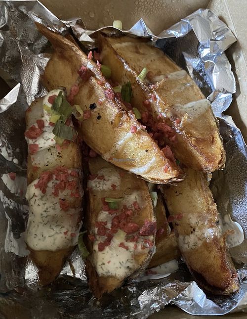 Potato wedges with garlic aioli   at The Happy Bakery in Ofallon